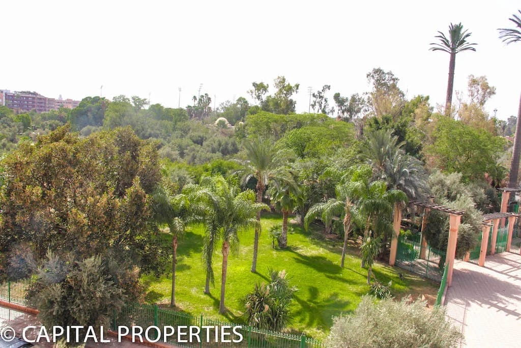 Location longue duree appartement sur jardin Harti Marrakech - Photo 2